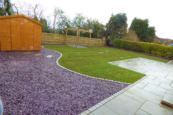 Completed Burbank patio with outdoor kitchen and seating area