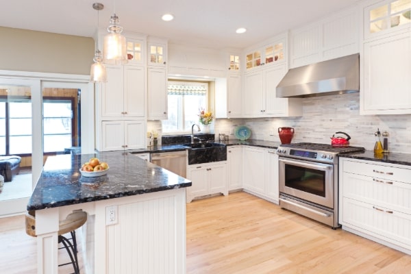 Completed Burbank kitchen remodel with quartz countertops and modern lighting